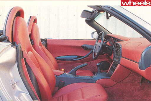 1996-Porsche -Boxster -986-drivingtop --rear