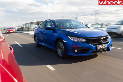 2016-Honda -Civic -RS-driving -front -side
