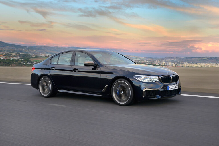 BMW M550i 2017 side front driving