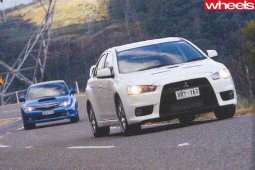 Mitsubishi -Lancer -Evolution -X-driving -with -Subaru -WRX-STi