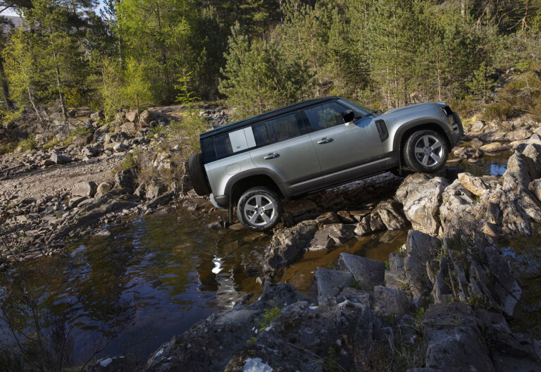 Land Rover Defender rock climb