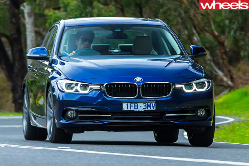 BMW-318i -driving -front -side