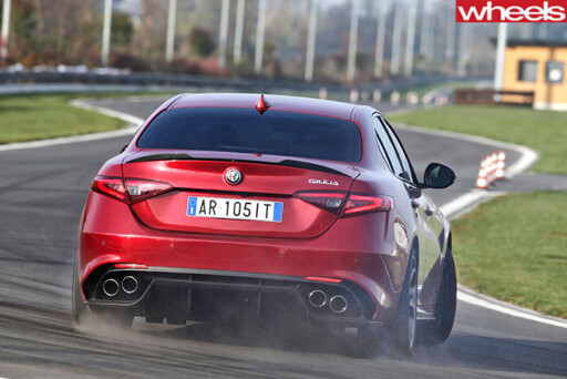 Alfa -Romeo _Quadrofoglio -rear -drifting -driving