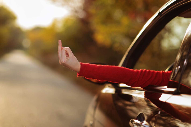 What hand signals while driving means