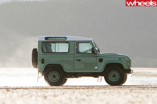 Land -Rover -Defender -driving -side -beach