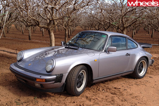 1989-Porsche -911-Carerra -parked -on -dirt