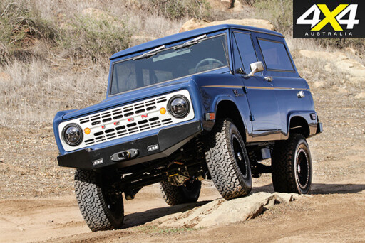 Ford Icon Bronco driving over rocks