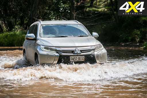 Mitsubishi Pajero Sport GLS driving through water