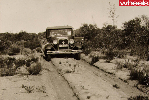 Historical -Ford -driving -dirt -road