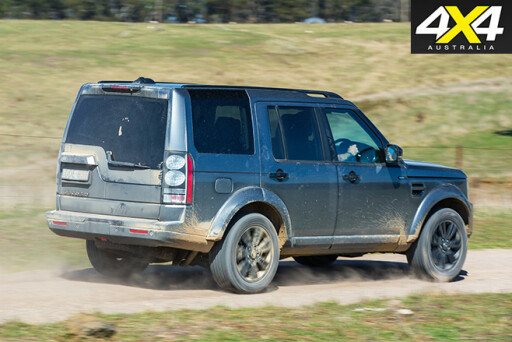 Land rover discovery driving on gravel