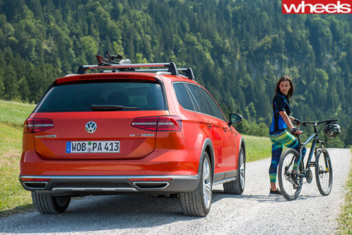 Red -Volkswagen -Passat -Alltrack -rear -country-