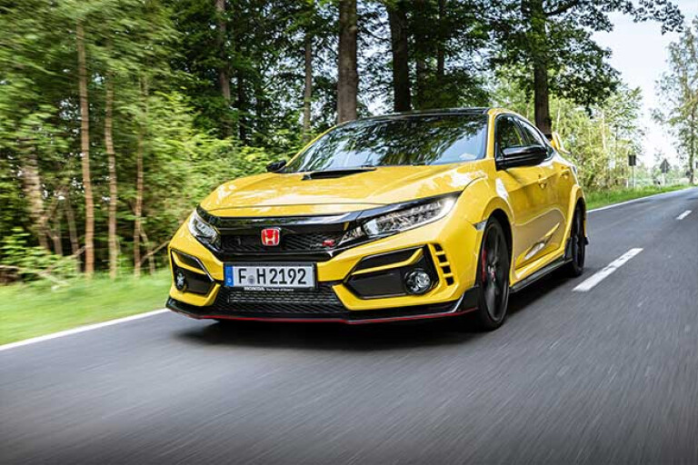 Honda Civic Type R Limited Edition driving on a road.