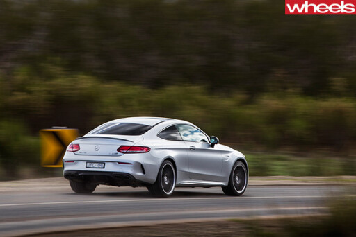 Mercedes -AMG-C63-Coupe -side -driving -rear