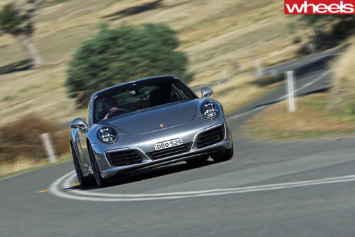 Porsche -911-Carerra -C2-S-Coupe -taking -corner
