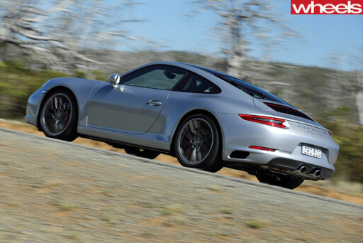 Porsche -911-Carerra -C2-S-Coupe -driving -side -rear -sunset