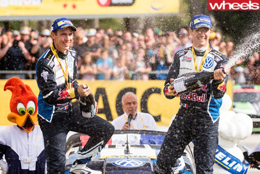 Sebastian -Ogier -celebrates -win -WRC-Spain -spraying -champagen