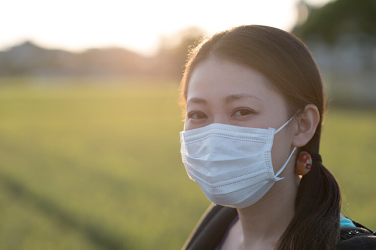 Lady in Japan wearing surgical mask