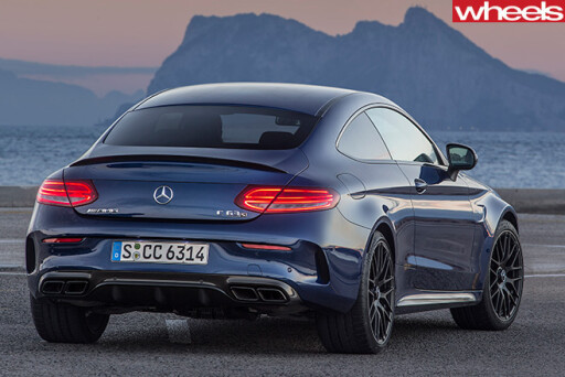Mercedes -C63-Amg -Coupe -driving -rear