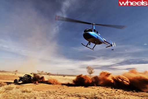 Helicopter -with -Off -road -vehicle -participating -in -Finke -Desert -Race -driving