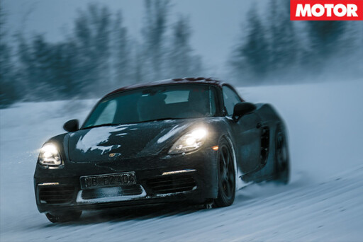 Porsche 718 Boxsters driving front in snow