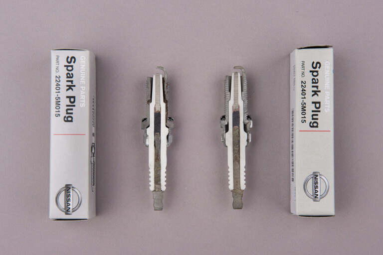 Genuine (L) and fake (R) spark plugs