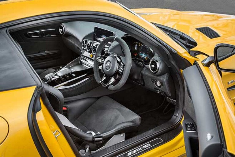 Four-point harnesses are standard in the GT R Pro.