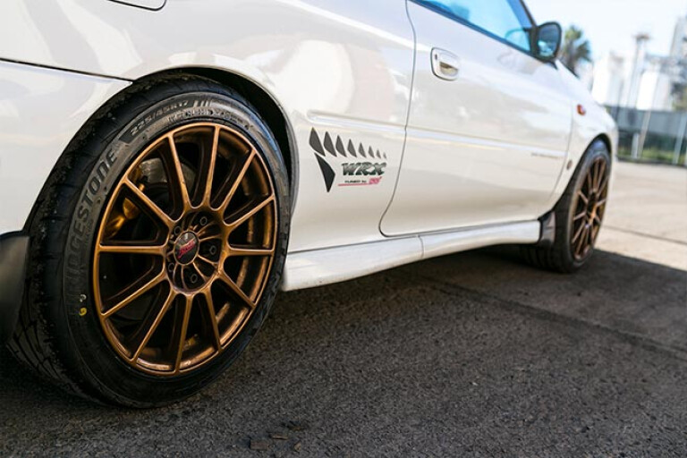 1999 Subaru WRX STi gold wheels