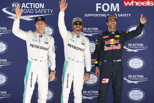 Daniel -Ricciardo -Lewis -Hamilton -standing -on -F1-podium
