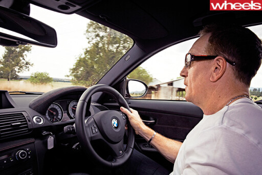 2013-BMW-1M-Coupe -driving -interior