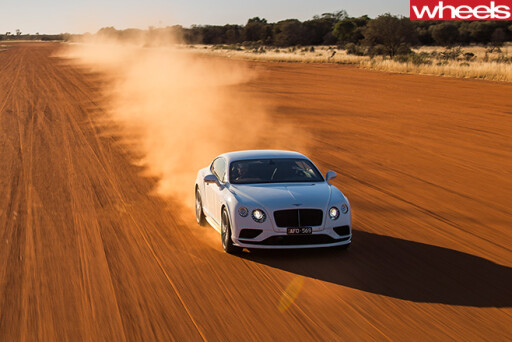 Bentley -driving -dirt -road