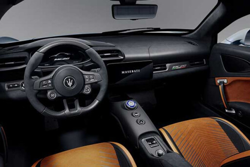 Maserati MC20 interior with sports steering wheel.