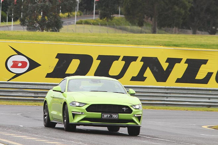 Ford Mustang powerslide on a racetrack