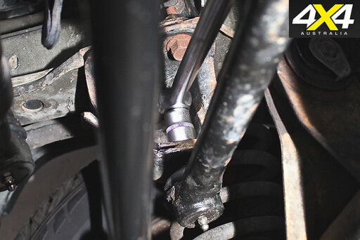 Remove castellated nut securing ball-joint