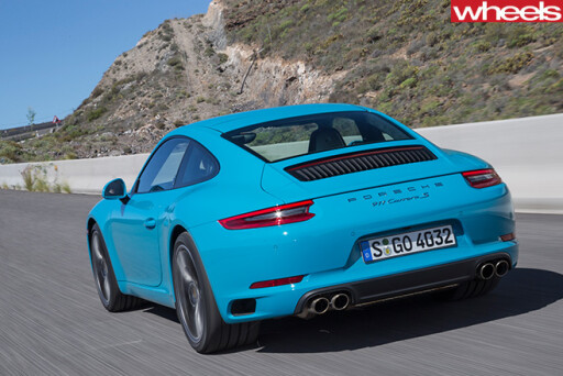 2016-Porsche -911-Carerra -rear -side -driving