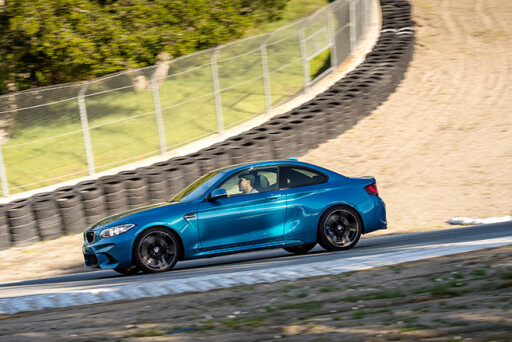 BMW-M2-driven -hard -around -a -track -side