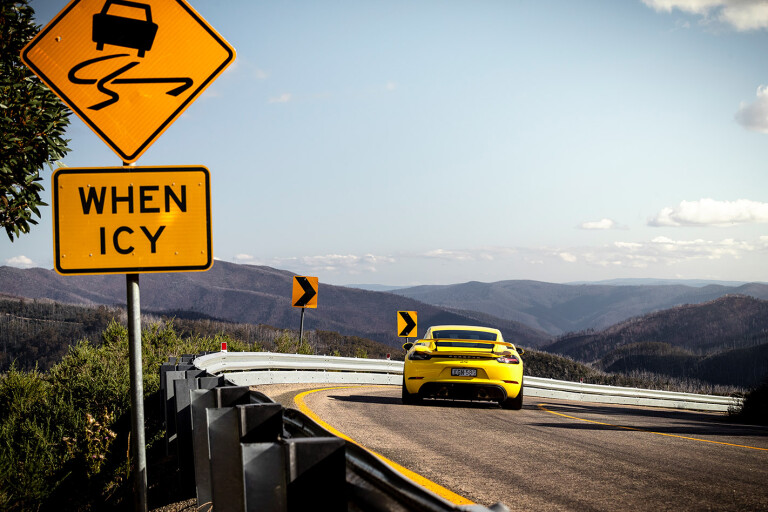 Porsche Cayman GT 4 Driving Corner Rear Jpg