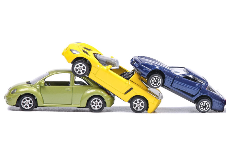 toy cars simulating a car crash