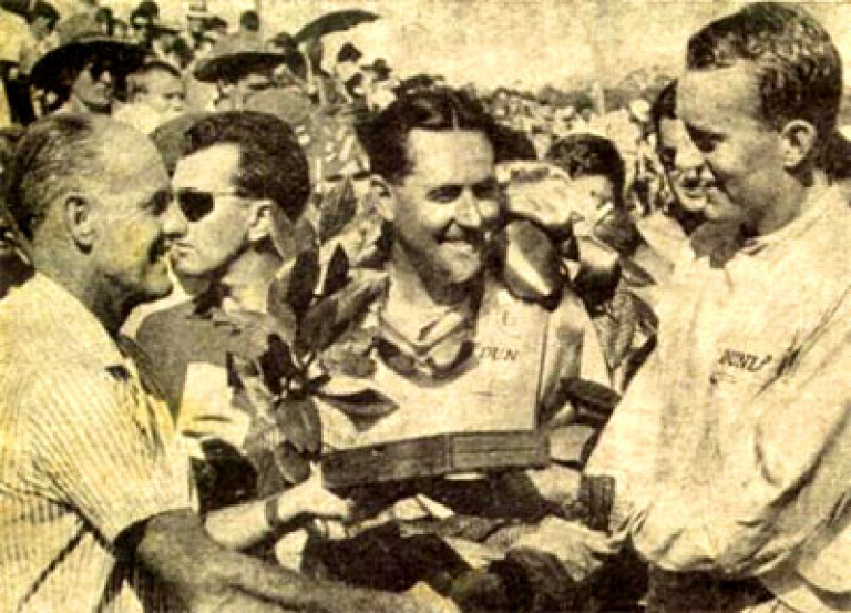 John Youl, centre, receiving one of many trophies