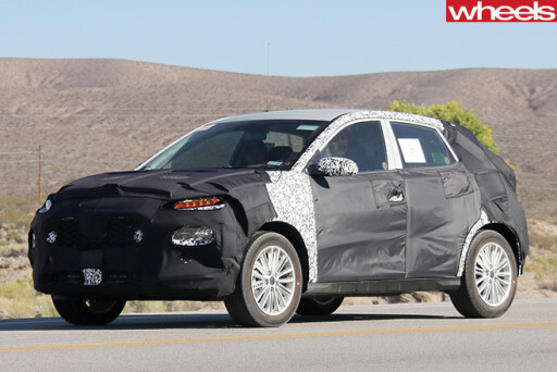 Kia -CUV-front -driving -side