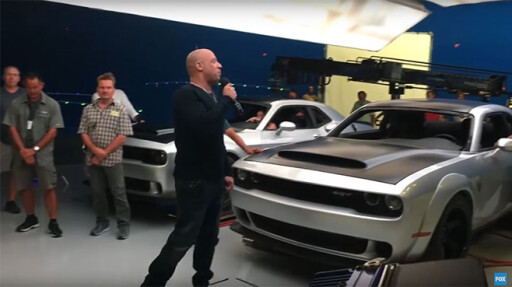 Vin Diesel standing in front Challenger SRT Demon