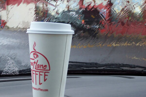 Coffee Cup On Car Dash Jpg