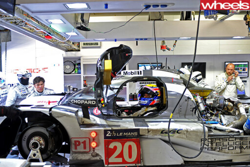 Porsche -team -in -garage