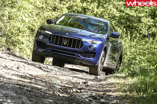 Maserati -Levante -driving -hill-