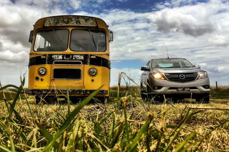 Mazda Bt 50 Holiday Report Next To A Bus Jpg