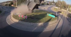car jumps roundabout