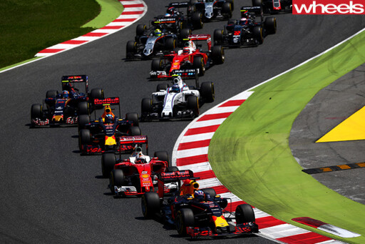 F1-race -cars -driving -around -circuit
