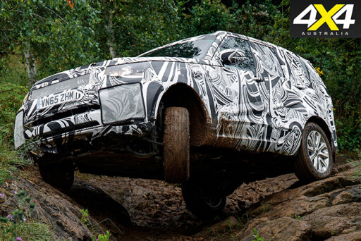 Fifth-gen Land Rover Discovery driving forest