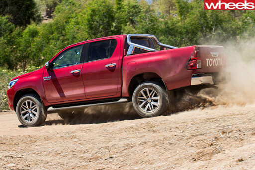 Toyota -Hilux -Range -driving -on -dirt