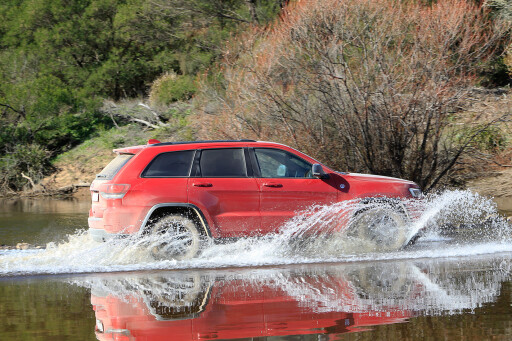 2017 Jeep Grand Cherokee Trailhawk driving through water.jpg