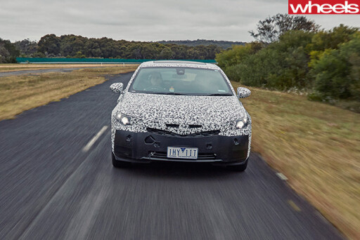 2018-Holden -Commodore -sand -driving -front